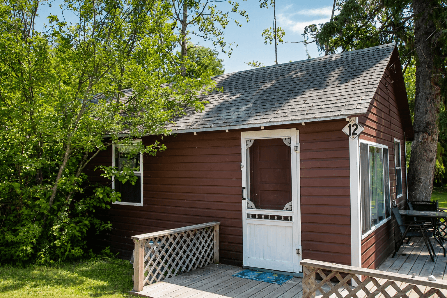 Interior and exterior view of a 3-bedroom Redden's Camp cabin on Longbow Lake near Kenora