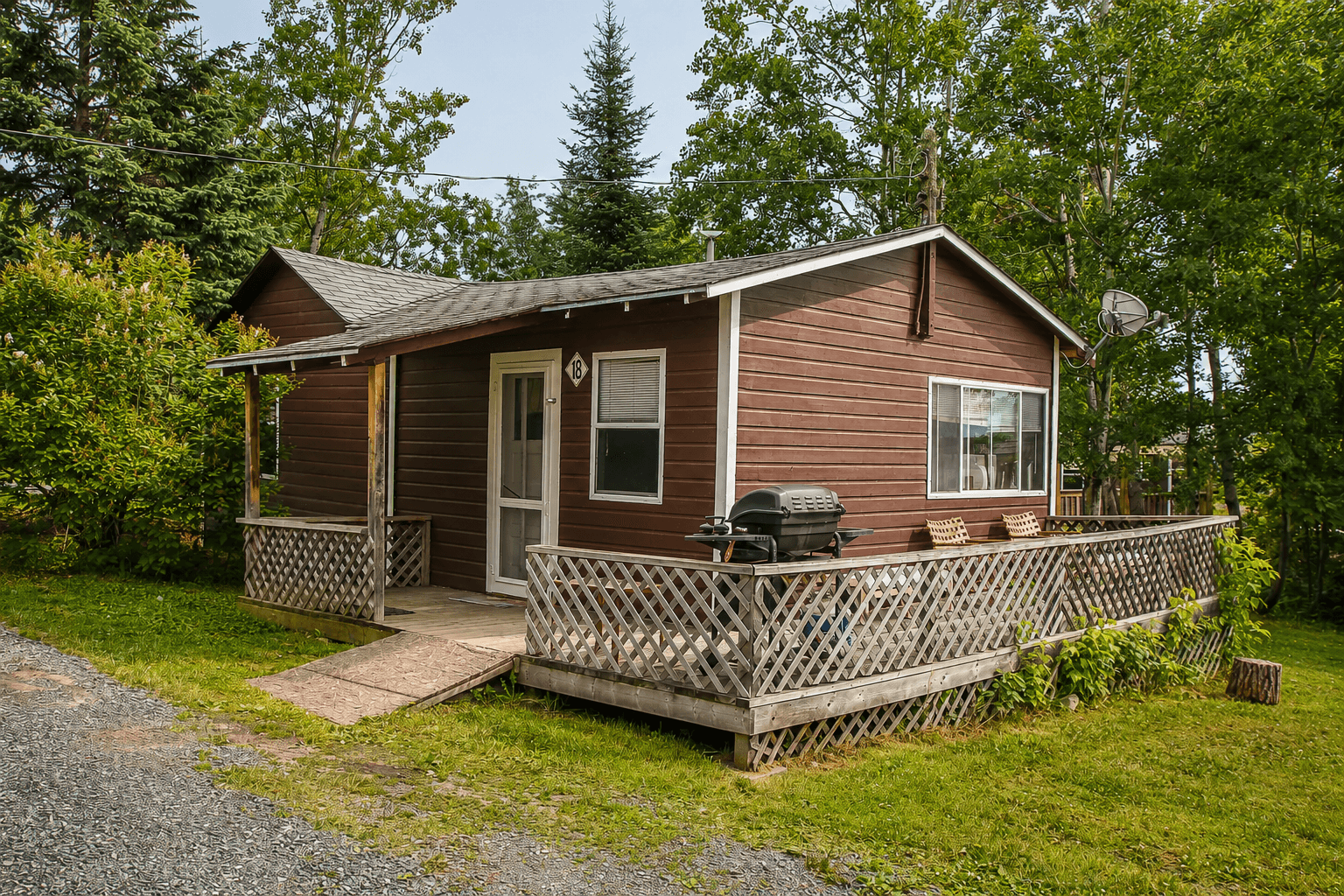 Interior and exterior view of a 2-bedroom Redden's Camp cabin on Longbow Lake near Kenora